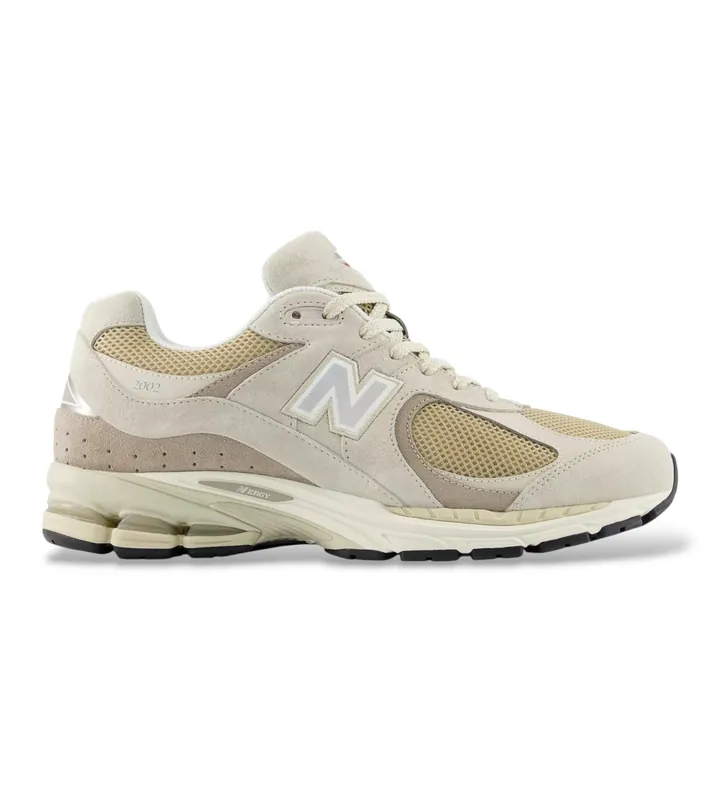 New Balance unisex. U2002RV1 Zapatillas 2002 beige (36), Plano, Cordones, Casual