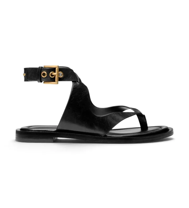 Michael Kors para mujer. 40T6IRFS1L Sandalia Irene de piel con tiras cruzadas negro (36), Plano, Hebilla, Casual