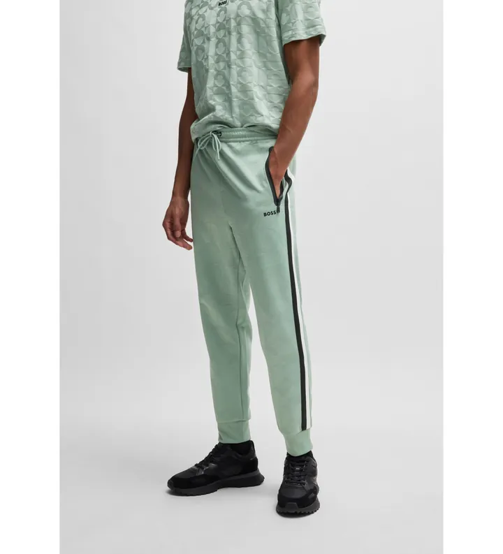 BOSS para hombre. 50537373 Pantalón de chándal relaxed fit con círculos tejidos en jacquard verde (XS), Casual, Poliéster