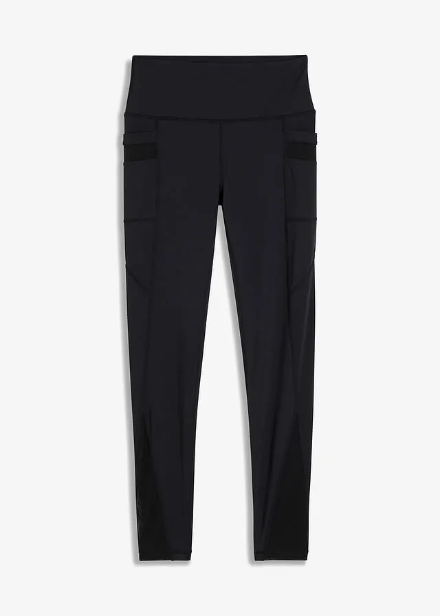 Cómodos leggings deportivos con malla y bolsillo para móvil