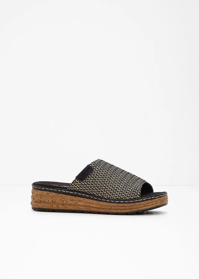 Mules con cuña de Rieker