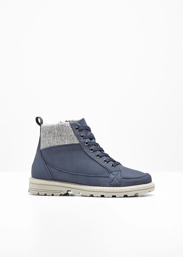 Botas con cordones y suela perfilada