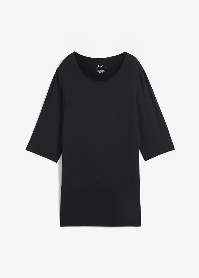 Camiseta deportiva larga con abertura y material de secado rápido
