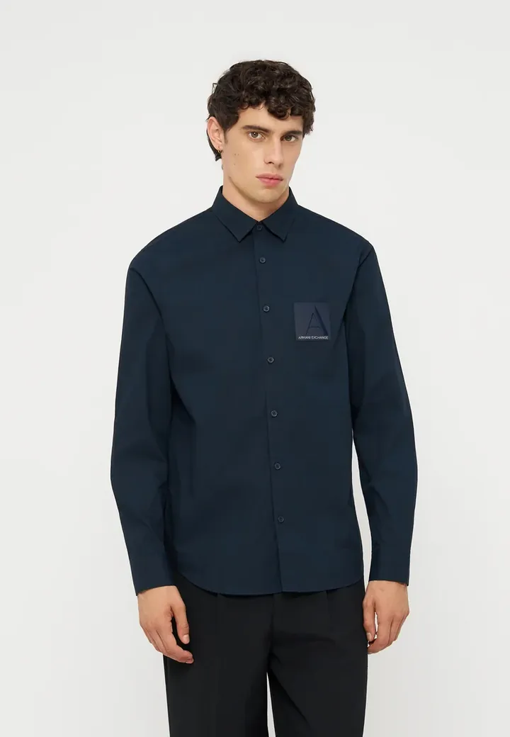 Camisa