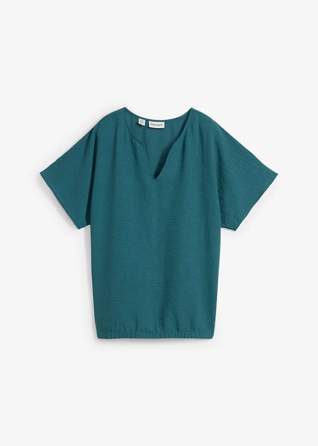 Blusa holgada con dobladillo elástico